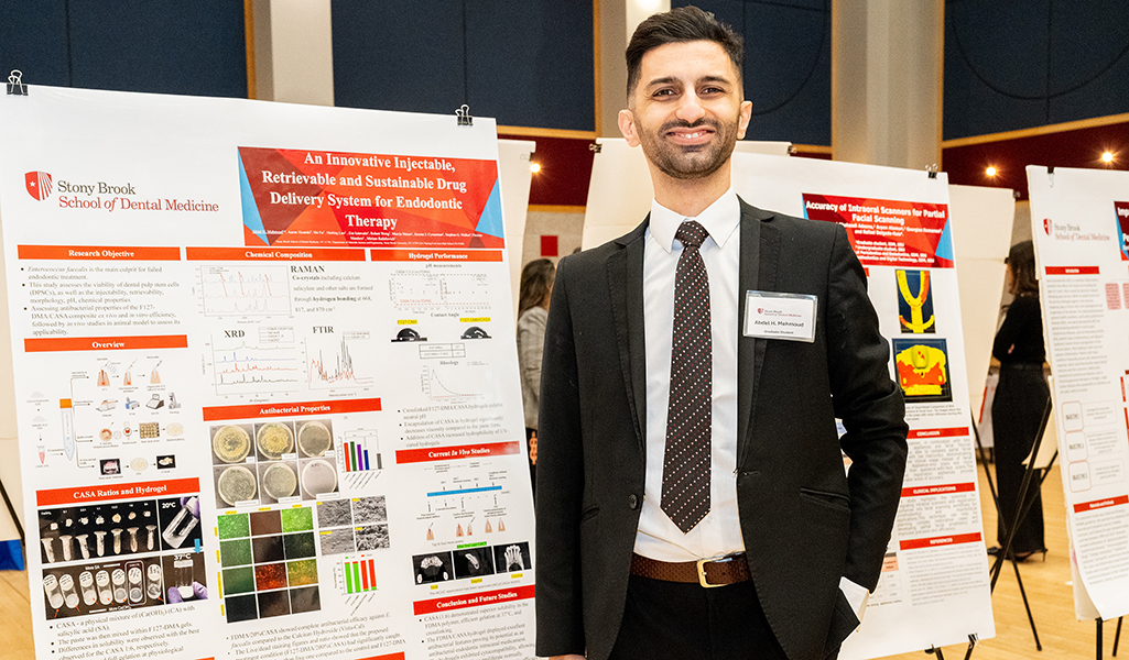Abdel Hameed Mahmoud standing in front of his poster at Stony Brook's 2025 Research Symposium