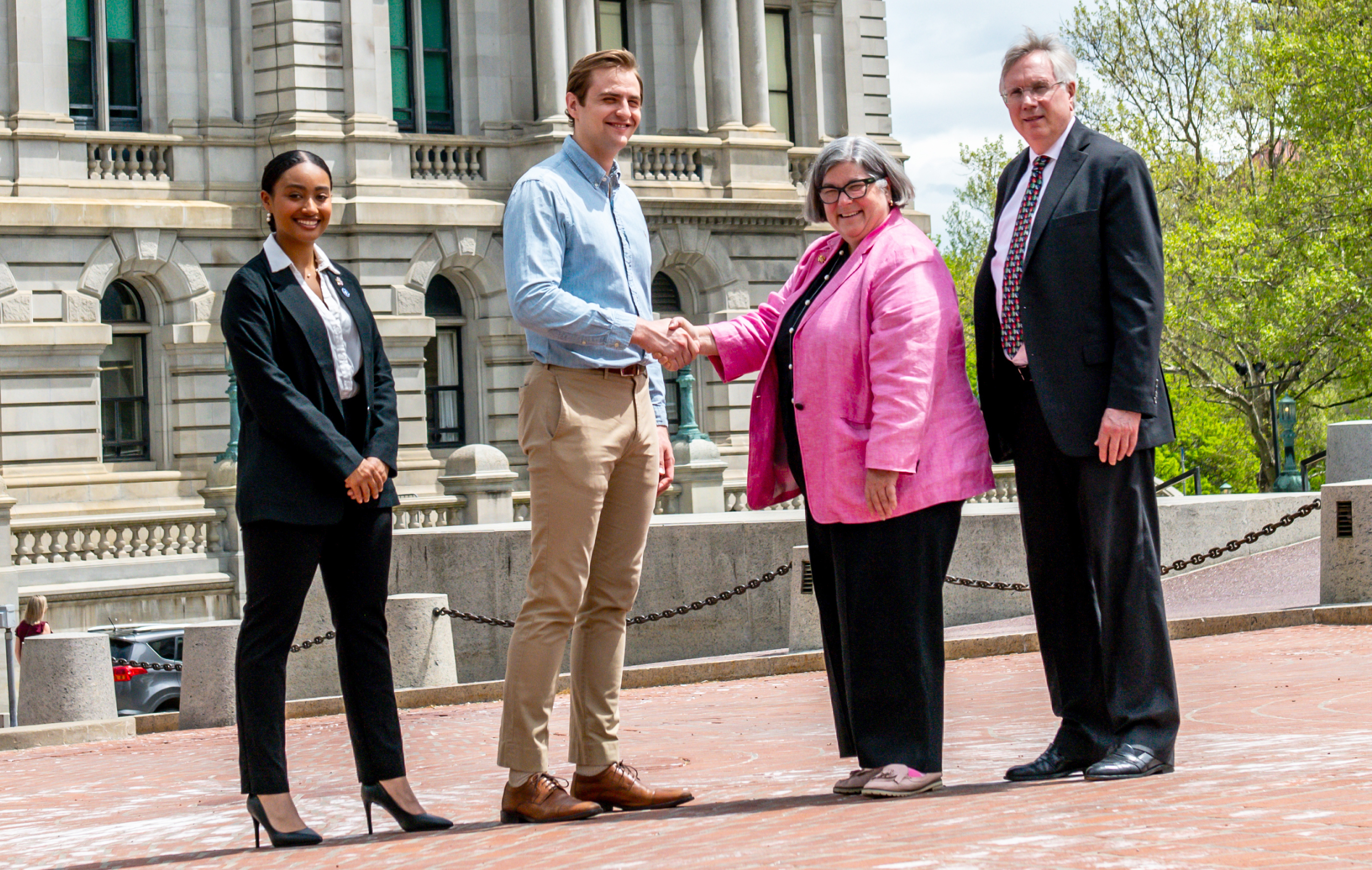 Stony Brook students Christina Chalmers and Anthony Monaco, as well as Dean Patrick Lloyd, met with New York State Assemblywoman Carrie Woerner to advocate for improvements in oral health that will benefit patients, providers and communities throughout the state.