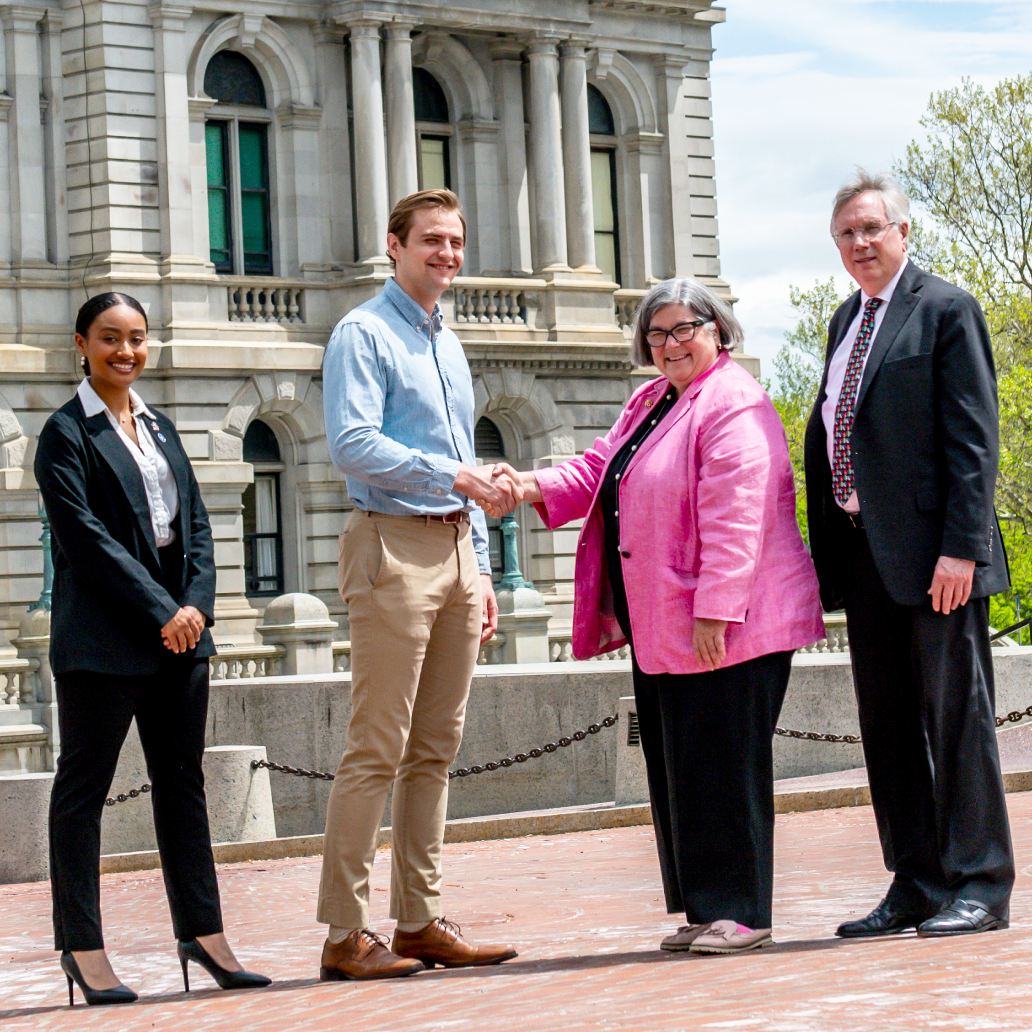 Stony Brook students Christina Chalmers and Anthony Monaco, as well as Dean Patrick Lloyd, met with New York State Assemblywoman Carrie Woerner to advocate for improvements in oral health that will benefit patients, providers and communities throughout the state.
