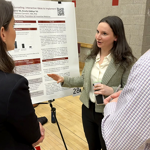 Student presenting research