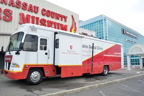 The Mobile Dental Clinic in front of Give Kids a Smile at the Cradle of Aviation