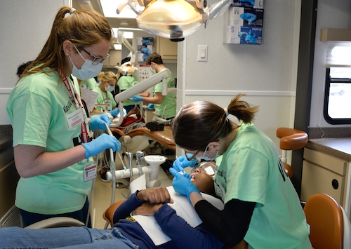 SDM Dental Professionals and Students Provide Care to Children at Give Kids a Smile Day