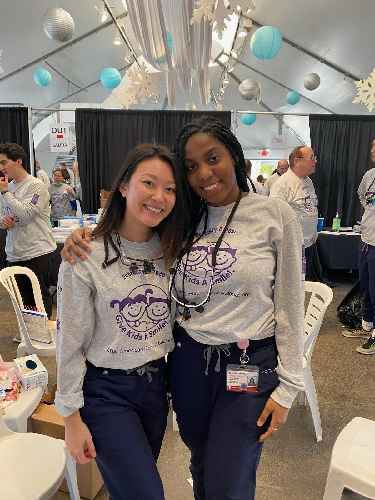 Stony Brook School of Dental Medicine students Tiffany Chung and Jennifer Michel at Suffolk County Dental Society's Give Kids A Smile event. 