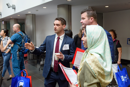 Igor Lantsberg, Class of 2018, presents research findings to Dr. Charles Larsen and Dr. Mina Mahdian