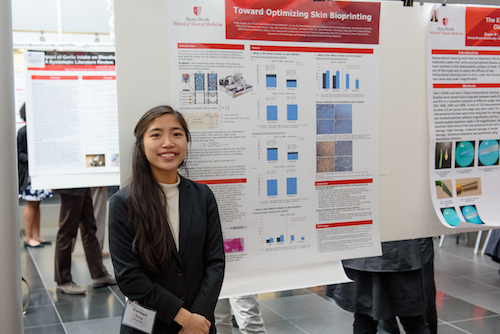 Carmen Hung, BS, presents her research poster "Towards Optimizing Skin Bioprinting"