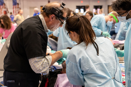Stony Brook School of Dental Medicine Team Treats A Patient at Remote Area Medical Event in Cookeville, TN