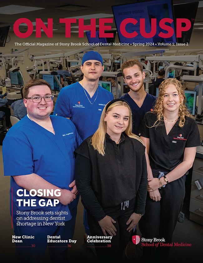 On the Cusp magazine front cover - five students standing in lab