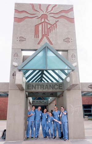 Stony Brook School of Dental Medicine Students Outside Pine Ridge Indian Health Services Hospital Facility