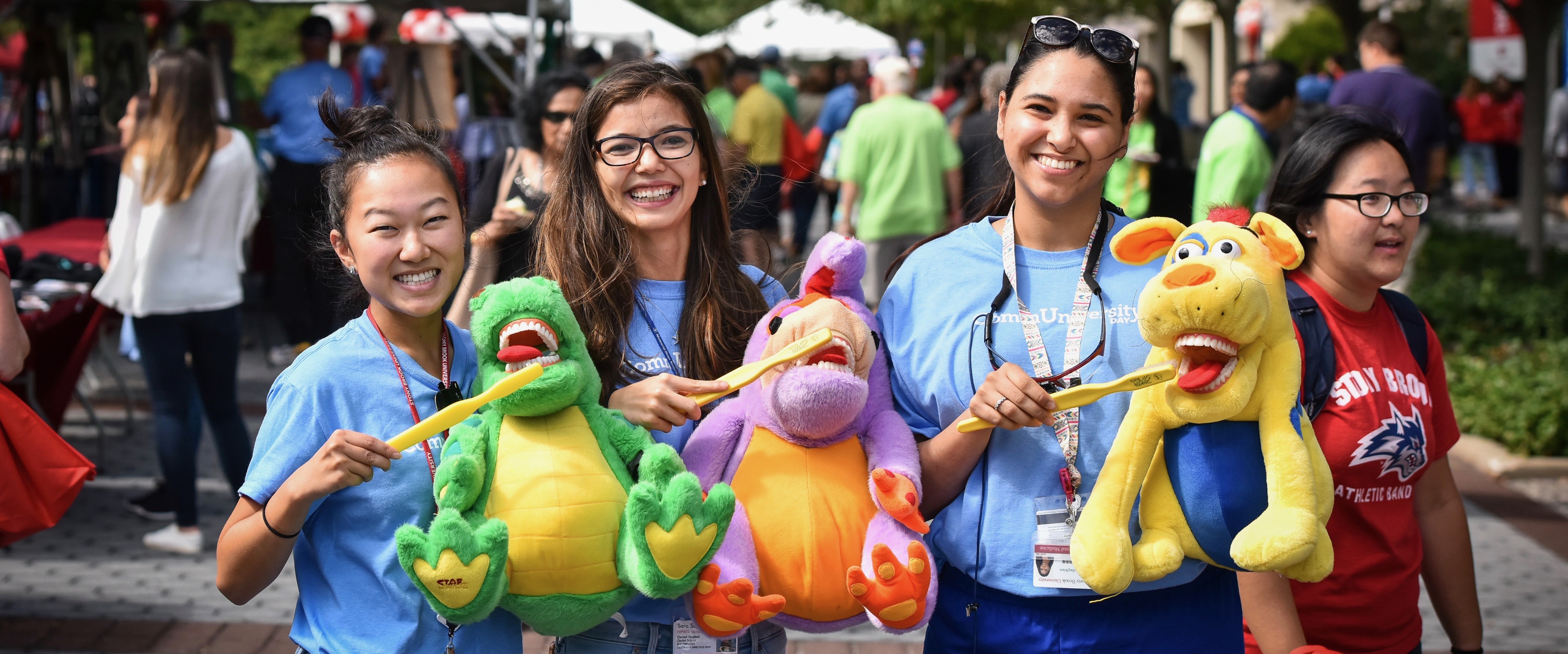 Stony Brook School of Dental Medicine Students with Oral Health Education Puppets at the 2018 CommUniversity Day at Stony Brook University