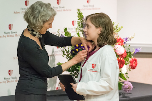 Rebekah Elizabeth London Receives Dental Assistant Graduation Pin From Maria Nardiello